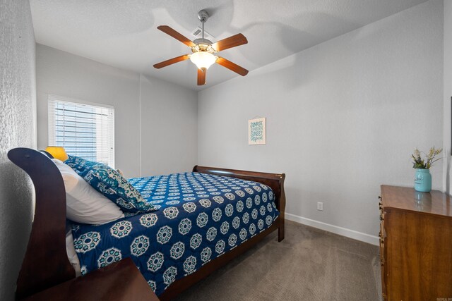 bedroom with carpet, a closet, and ceiling fan