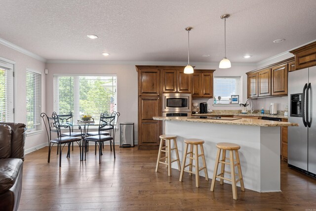 dining space featuring light hardwood / wood-style flooring and ornamental molding