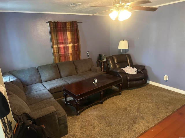 living room with ceiling fan, hardwood / wood-style floors, and crown molding