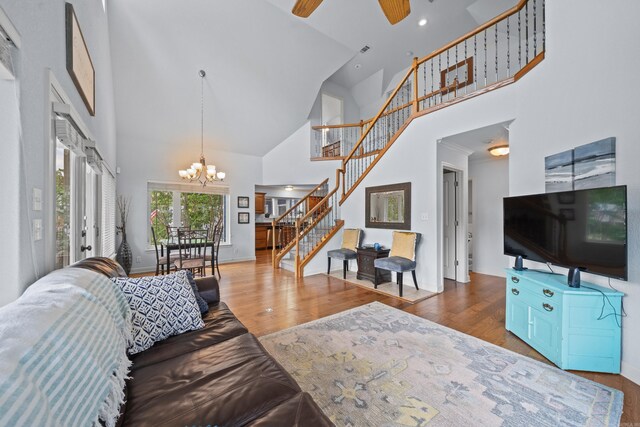 carpeted living room with a textured ceiling and vaulted ceiling