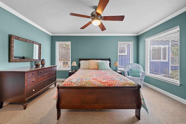 bedroom with a textured ceiling, light colored carpet, ceiling fan, and crown molding