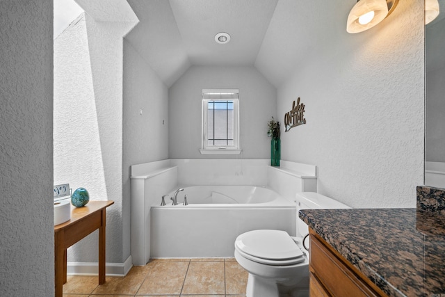 bathroom with a textured ceiling, lofted ceiling, tile patterned floors, toilet, and a washtub