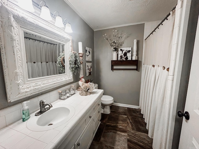 bathroom with toilet, a textured ceiling, and vanity