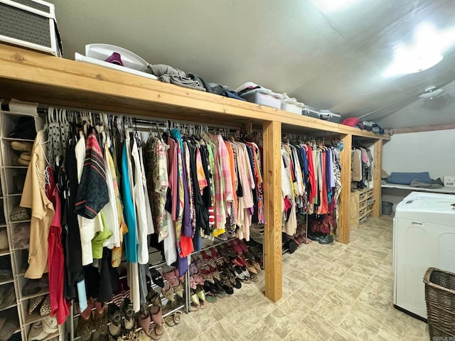 1499 Sutterfield Rd, Fox, AR 72051 - walk in closet featuring washer / clothes dryer, vaulted ceiling, and tile patterned floors