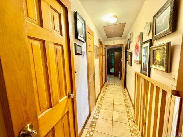 hallway with light tile patterned floors