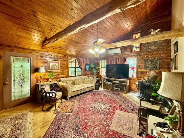 1499 Sutterfield Rd, Fox, AR 72051 - living area featuring wooden walls, wood finished floors, a wall mounted AC, wooden ceiling with exposed beams, and ceiling fan