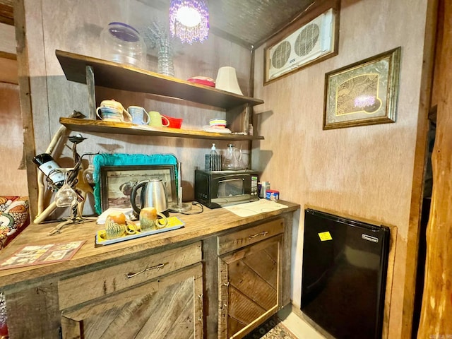 1499 Sutterfield Rd, Fox, AR 72051 - bar area featuring black appliances