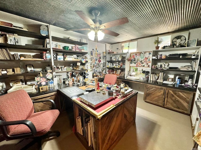 1499 Sutterfield Rd, Fox, AR 72051 - office area with ceiling fan and concrete flooring