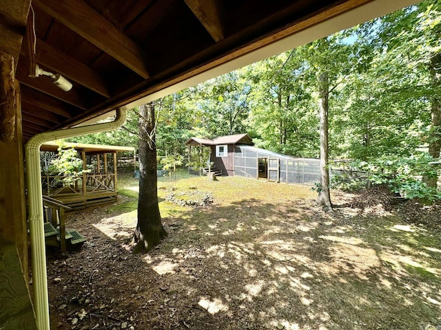 1499 Sutterfield Rd, Fox, AR 72051 - view of yard featuring an outdoor structure and view of scattered trees