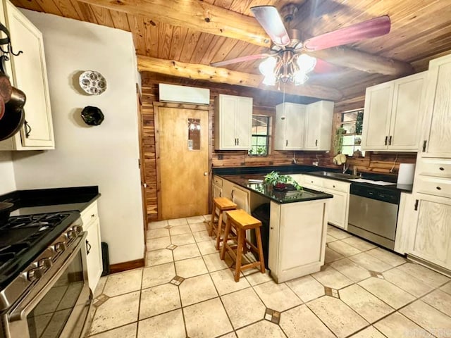 kitchen featuring stainless steel appliances, a kitchen bar, light tile patterned floors, wood ceiling, and ceiling fan