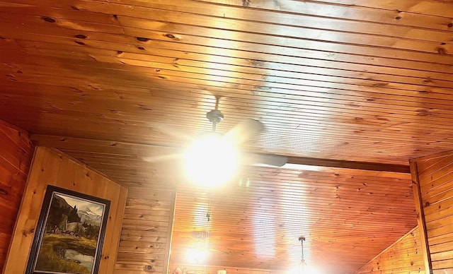 interior details featuring wood walls and wood ceiling