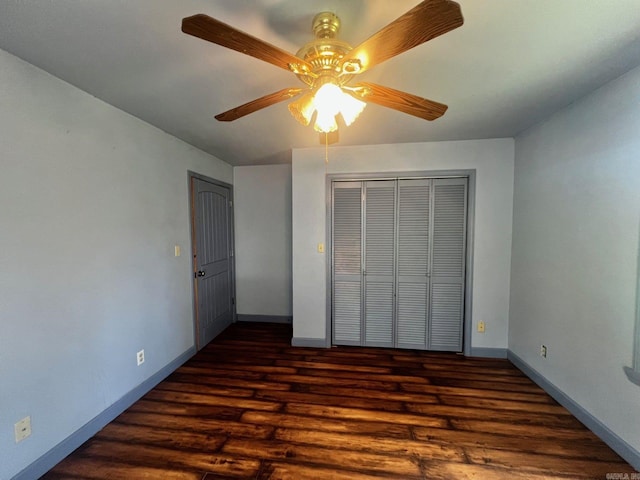 unfurnished bedroom with hardwood / wood-style flooring, a closet, and ceiling fan