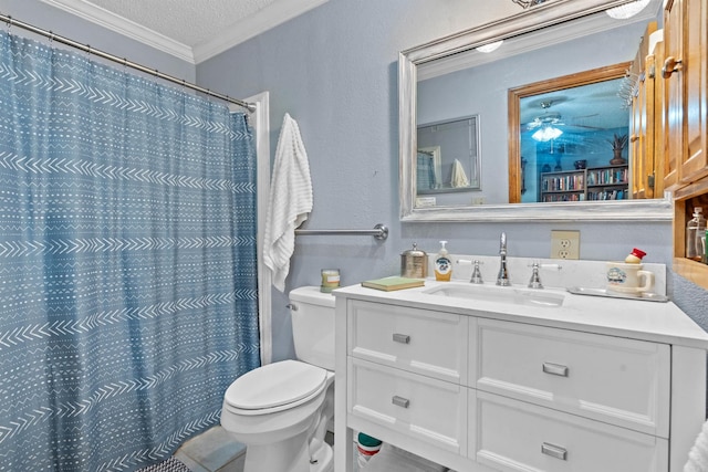 bathroom featuring crown molding, a textured ceiling, vanity, and toilet