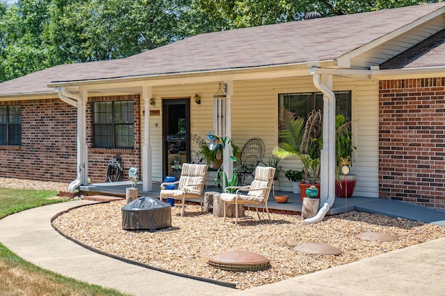 view of patio with an outdoor fire pit