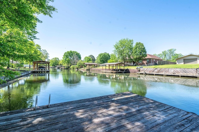 dock area with a water view