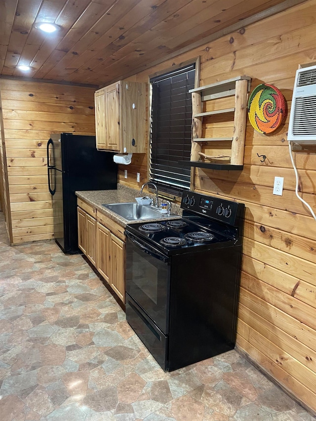 kitchen featuring wooden ceiling, stone finish floor, wood walls, black appliances, and a sink