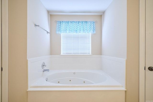 bathroom with a tub