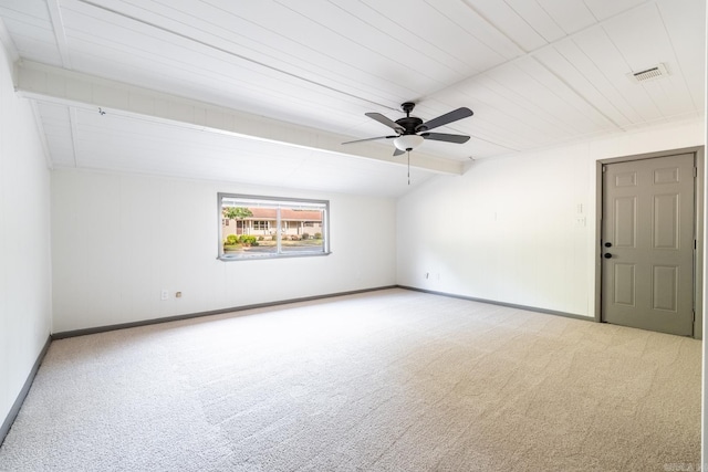 empty room featuring ceiling fan and light colored carpet