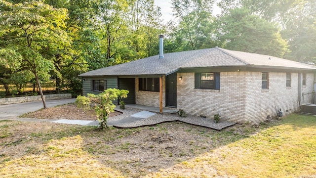 single story home featuring cooling unit