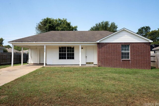 single story home with a carport and a front lawn