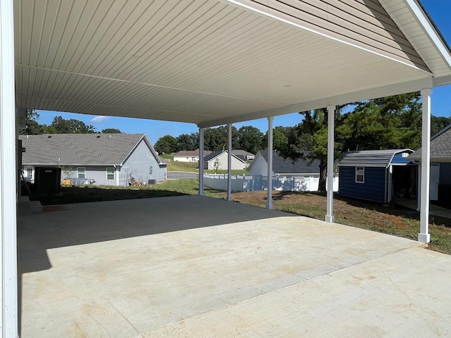 view of patio / terrace with a shed