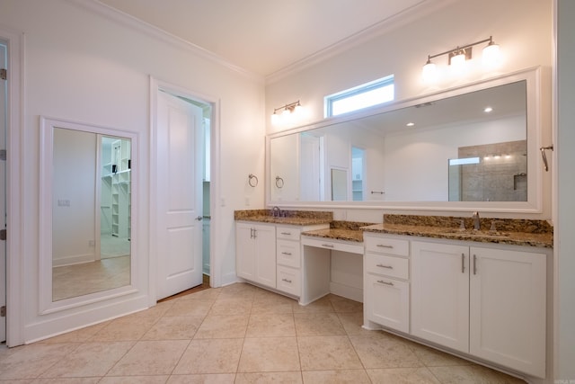 bathroom with tile patterned floors, double vanity, and ornamental molding