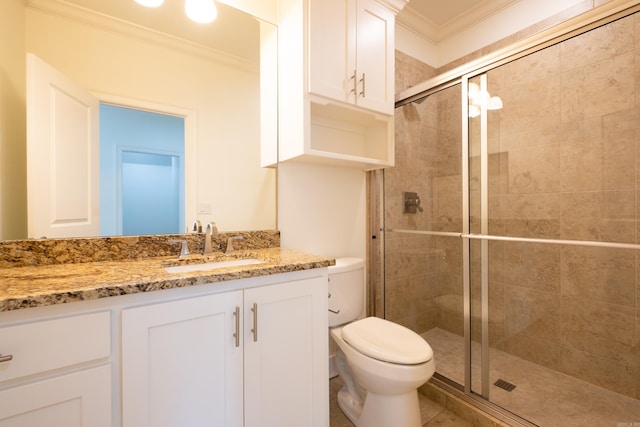 bathroom with ornamental molding, vanity, tile patterned floors, an enclosed shower, and toilet