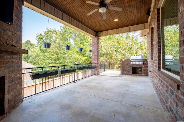 view of patio featuring ceiling fan, a grill, and area for grilling