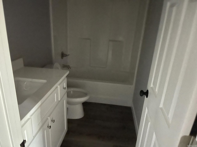 full bathroom featuring vanity, shower / bathtub combination, and toilet