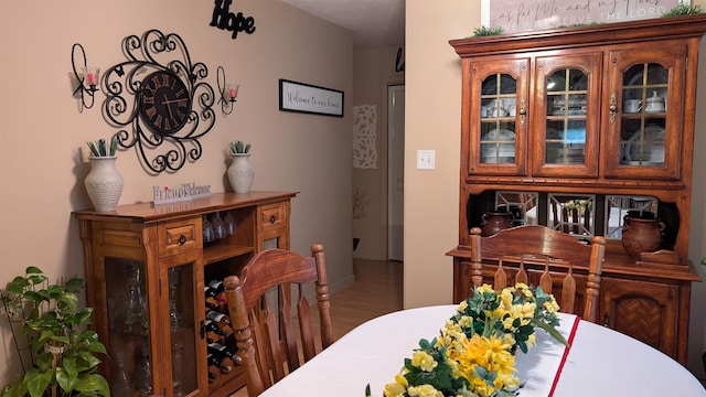 dining room with wood-type flooring