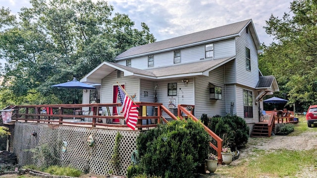 view of front of home with a deck