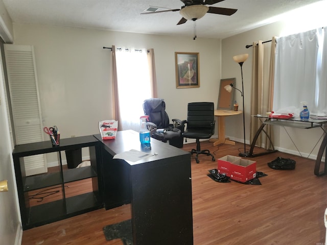 office space featuring ceiling fan and hardwood / wood-style floors