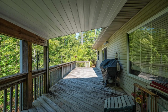 wooden terrace with grilling area