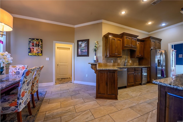 kitchen featuring backsplash, stone countertops, light tile patterned floors, and stainless steel appliances