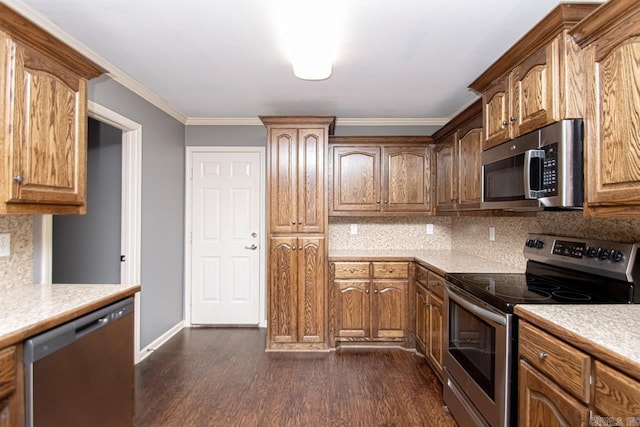 kitchen with decorative backsplash, stainless steel appliances, and dark wood-type flooring