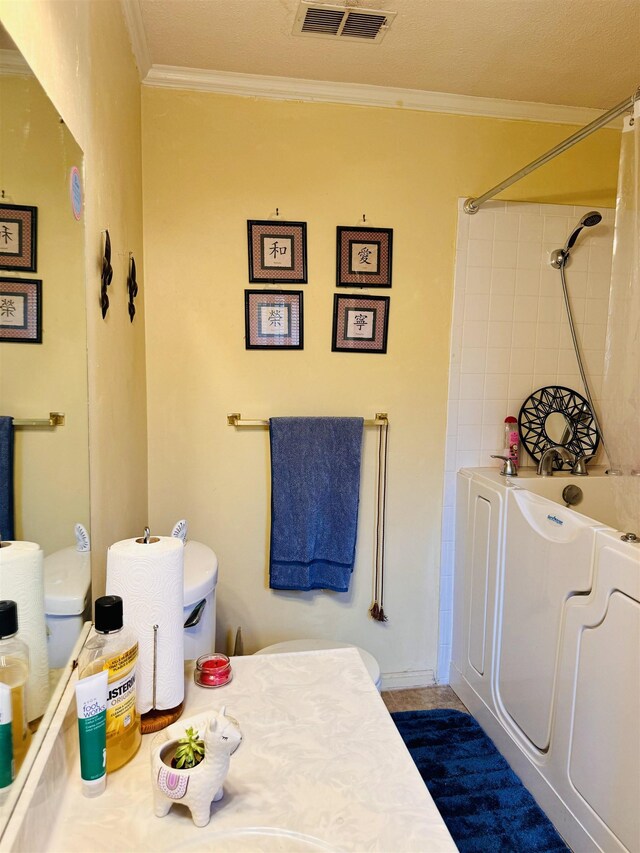 bathroom featuring crown molding, vanity, and tile patterned floors