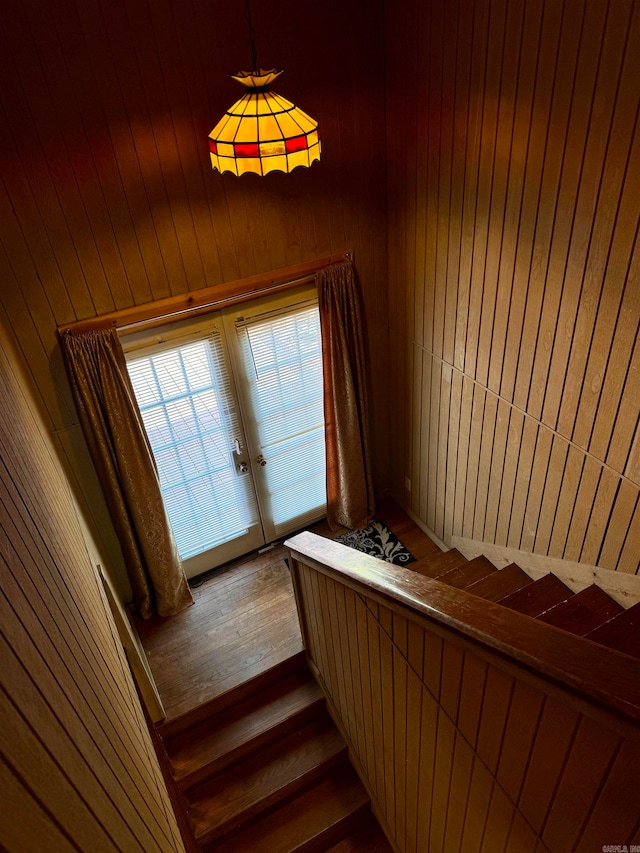 stairway featuring french doors