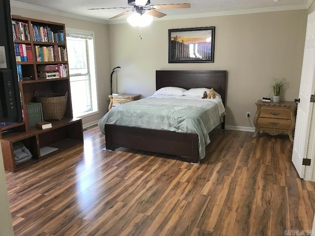 bedroom with ceiling fan, crown molding, and dark hardwood / wood-style floors