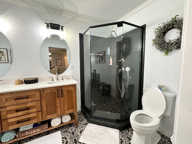 bathroom featuring a shower with shower door, toilet, tile patterned flooring, and vanity