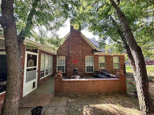 back of house featuring a patio area