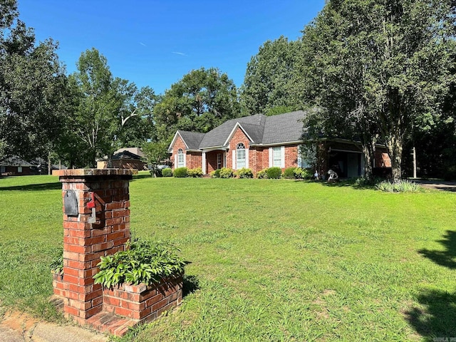 view of front of home with a front yard