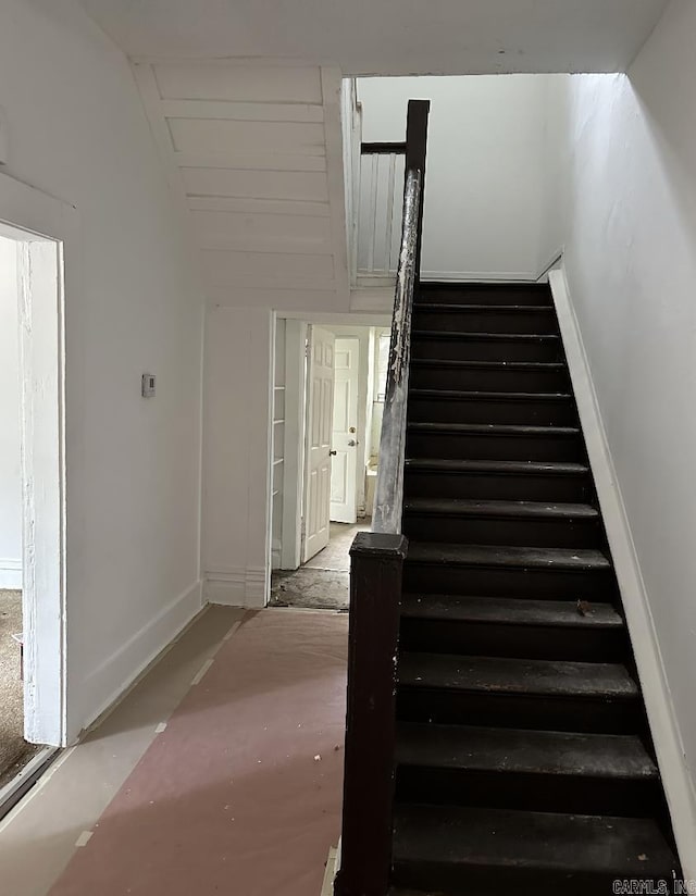 stairway with baseboards