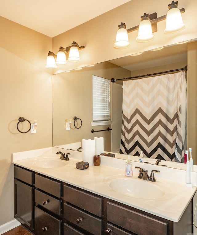 bathroom featuring vanity and a shower with curtain