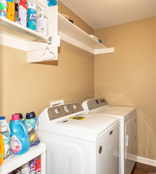 washroom with washing machine and dryer