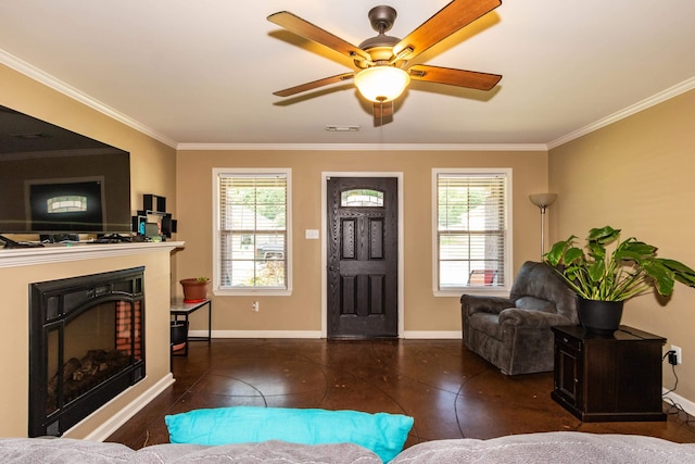 tiled living room featuring ceiling fan and crown molding