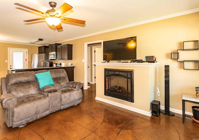 living room with ceiling fan and ornamental molding