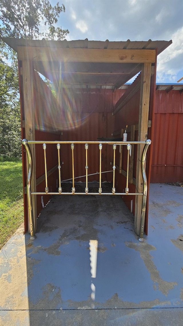 view of outbuilding featuring a carport