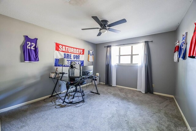 office area with ceiling fan and carpet floors