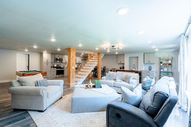 living area with billiards, baseboards, light wood-style flooring, stairway, and recessed lighting