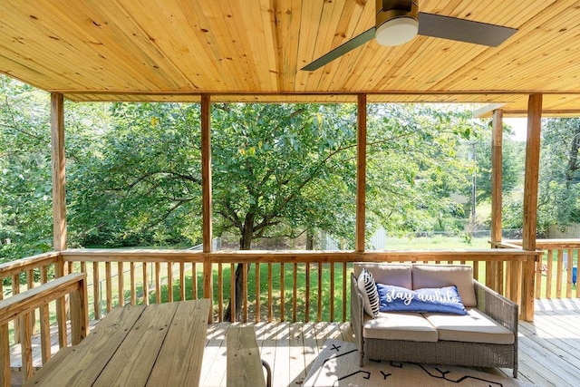 exterior space with wood ceiling and ceiling fan